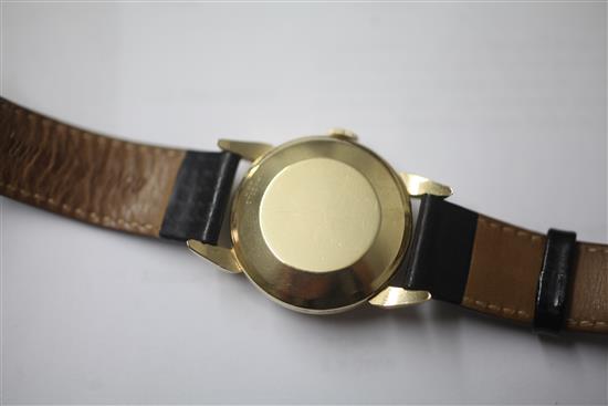 A gentlemans 1950s? 14ct gold Jaeger Le Coultre automatic wrist watch with power reserve indicator,